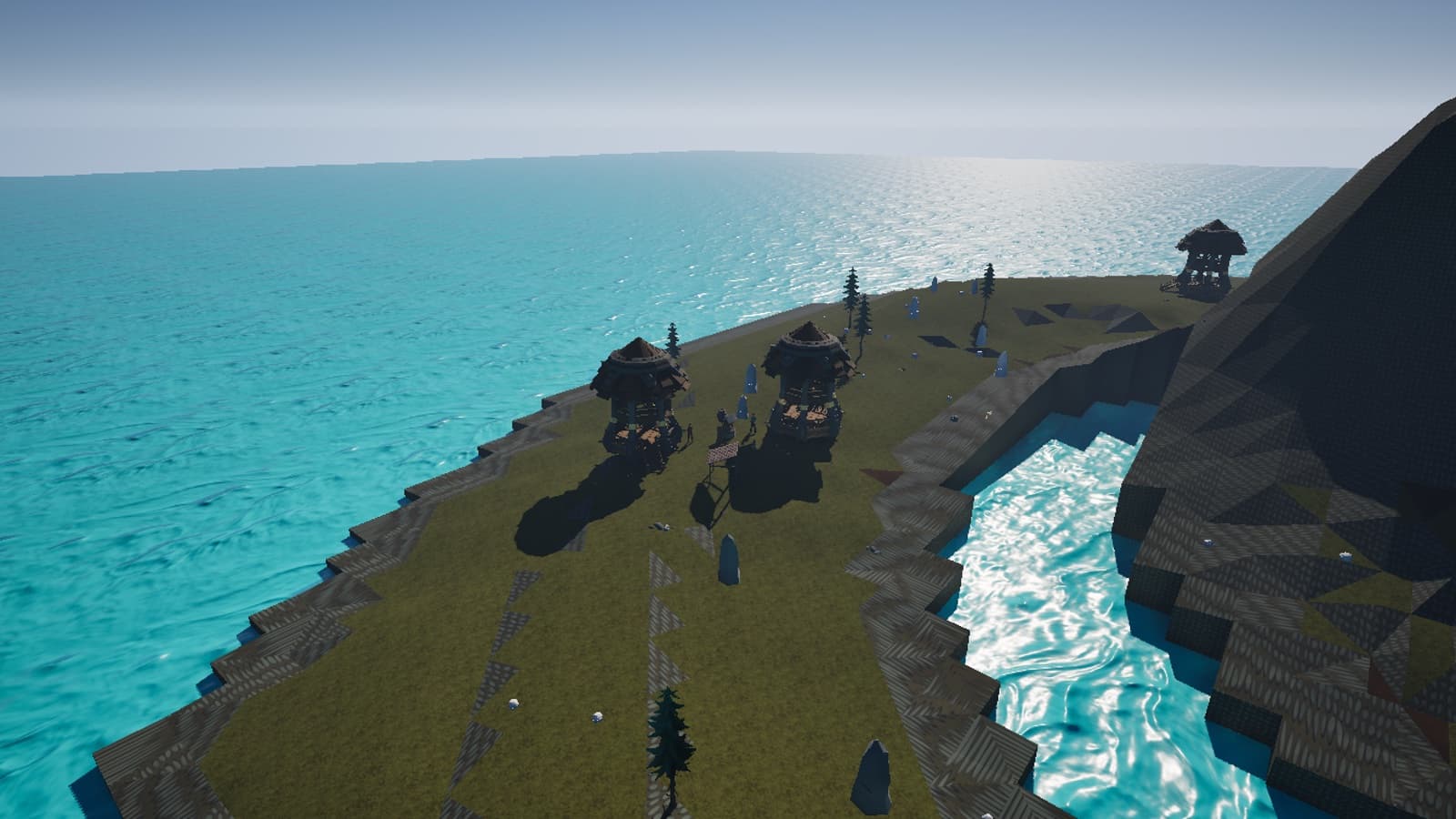 In-game view of High Beacon Hamlet beside rocky ground and open Atlantic water